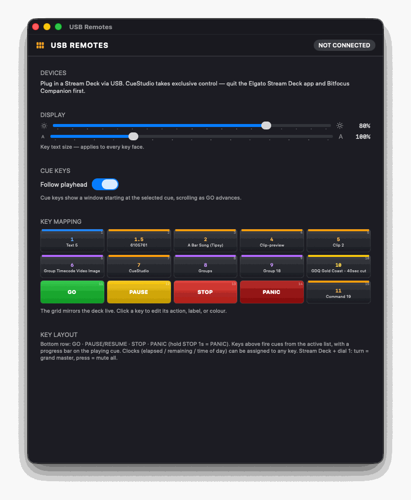 The USB Remotes window: brightness and key text size, a live key-mapping grid mirroring a Stream Deck with cue keys above and GO, PAUSE, STOP and PANIC along the bottom row.